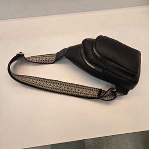 NWOT Women's sling backpack